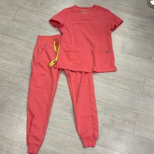 Figs scrubs in coral